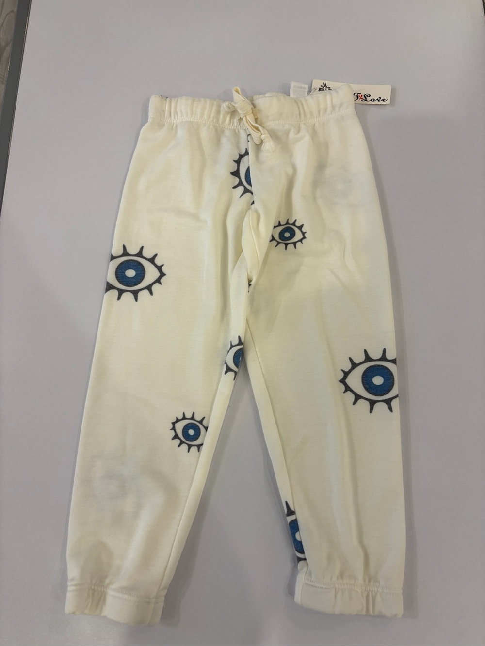 T2 Love Kids Eye-Print Cream Jogger Pants